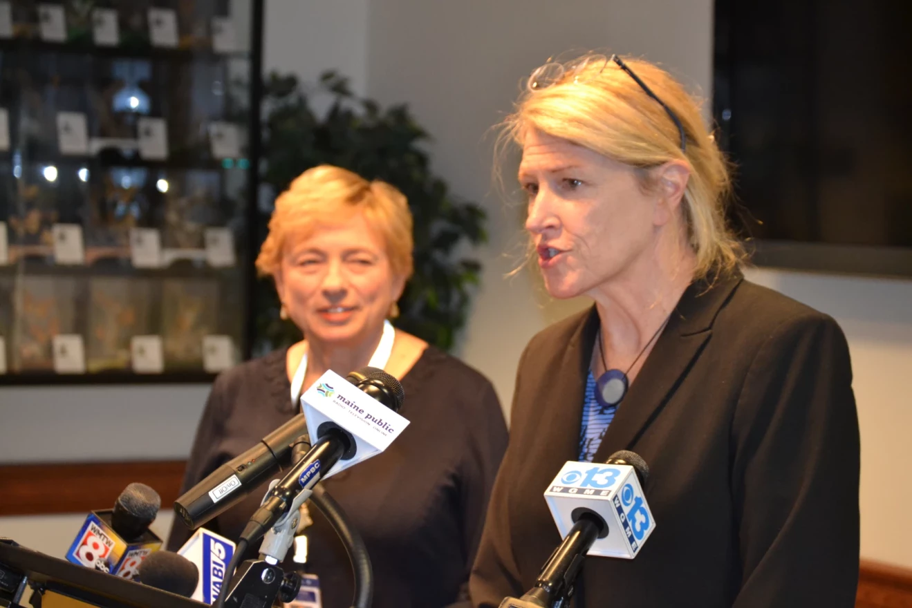 Janet Mills (left) and Jeanne Lambrew speak during a December 2018 press conference announcing Lambrew's nomination to lead the Maine Department of Health and Human Services.